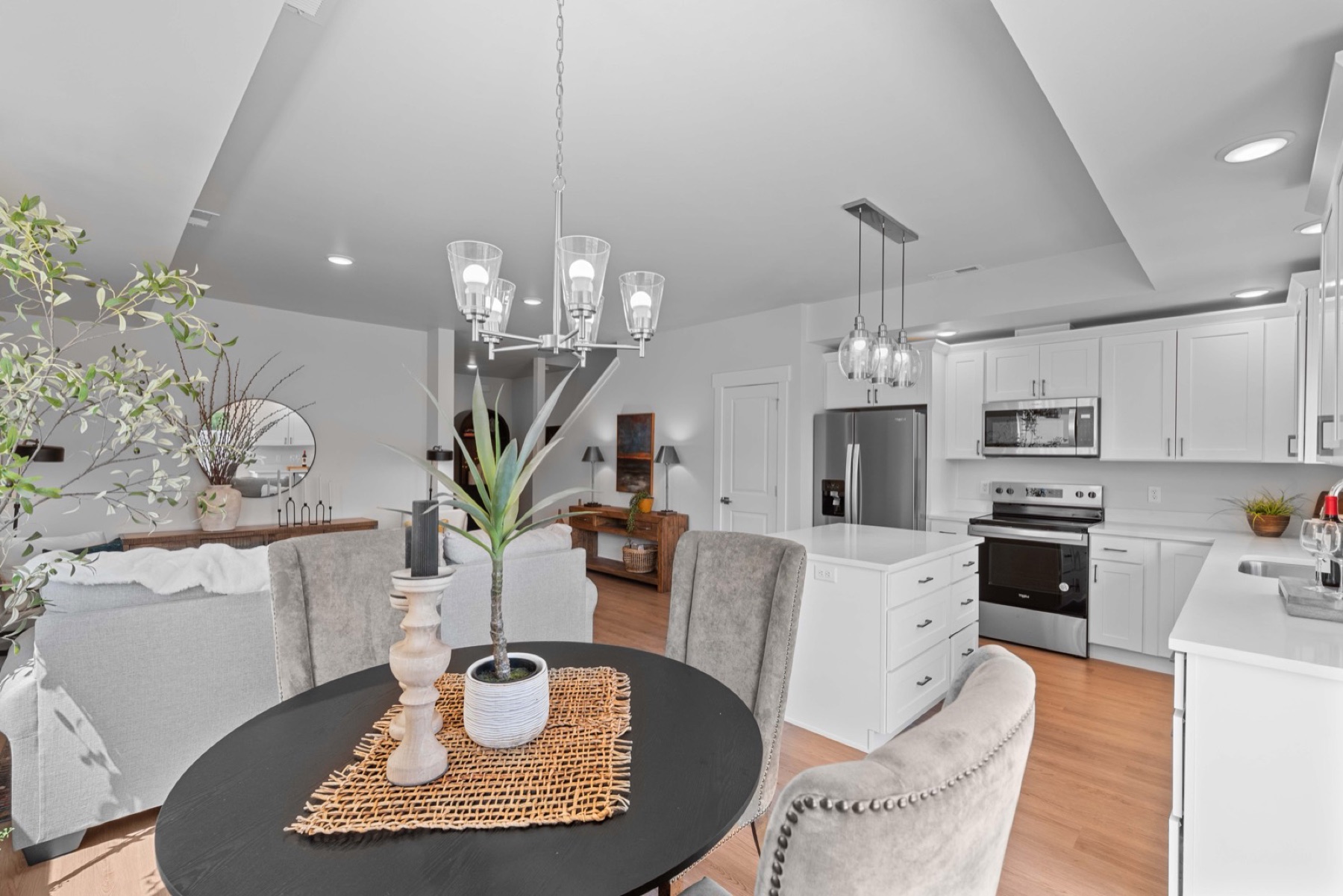 Springwater model home — dining and kitchen (staged; finishes may vary by unit)